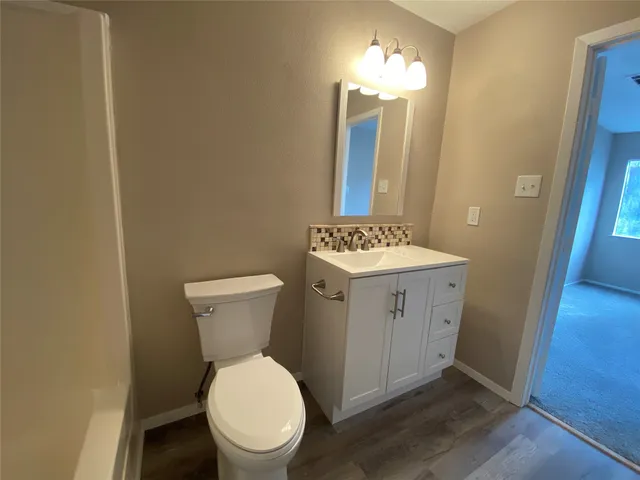 a view of a room with rack on the wall