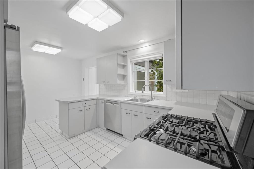 2800 Fernwald Road Pittsburgh, PA 15217 - Photo 16 of 37 a kitchen with sink cabinets and window