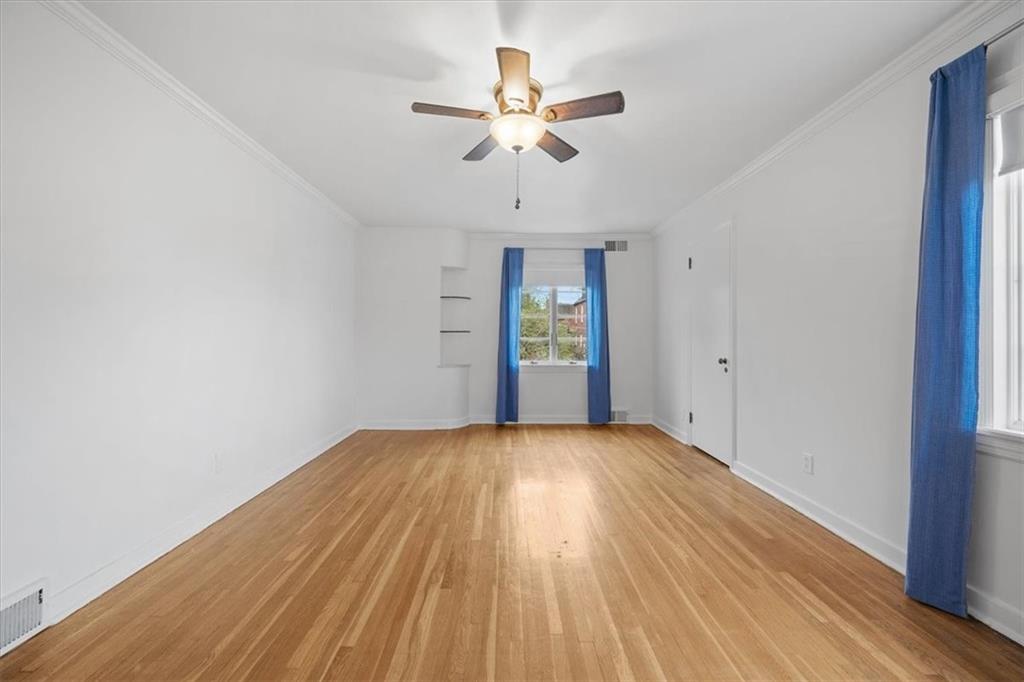 2800 Fernwald Road Pittsburgh, PA 15217 - Photo 24 of 37 wooden floor in an empty room with a window