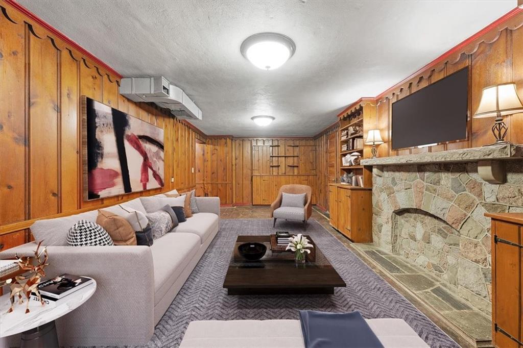 2800 Fernwald Road Pittsburgh, PA 15217 - Photo 27 of 37 a living room with furniture a rug and a fireplace