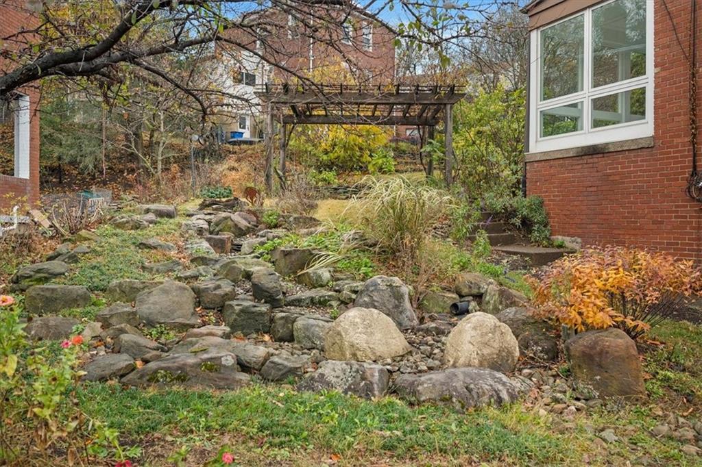 2800 Fernwald Road Pittsburgh, PA 15217 - Photo 37 of 37 a backyard of a house with lots of green space