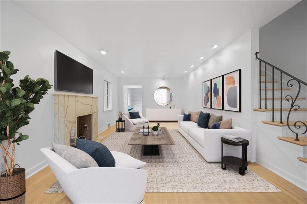 2800 Fernwald Road Pittsburgh, PA 15217 - Photo 6 of 37 a living room with furniture fireplace and a flat screen tv