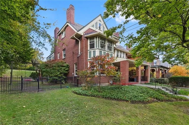 front view of house with a yard