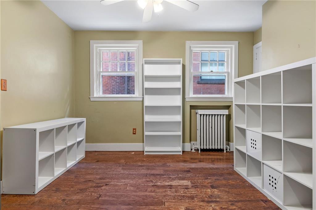 5515 Darlington Road Pittsburgh, PA 15217 - Photo 25 of 50 a view of room with wooden floor and windows
