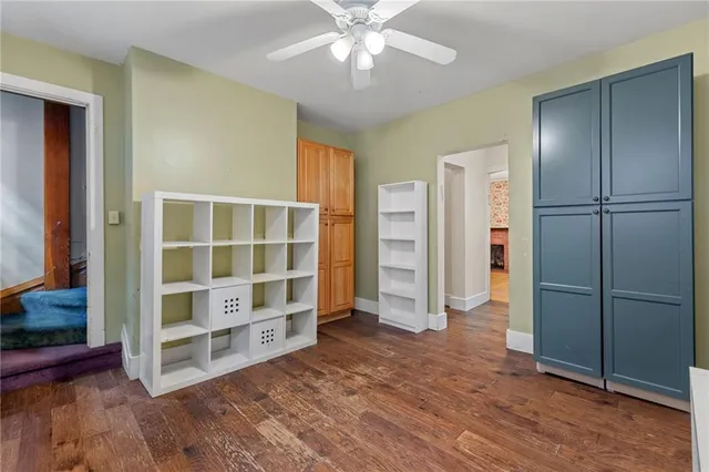 a bathroom with a sink toilet and a mirror