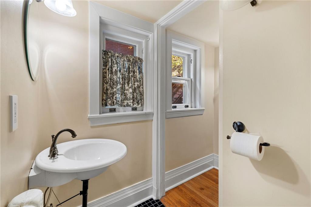 5515 Darlington Road Pittsburgh, PA 15217 - Photo 28 of 50 a bathroom with a sink and a mirror