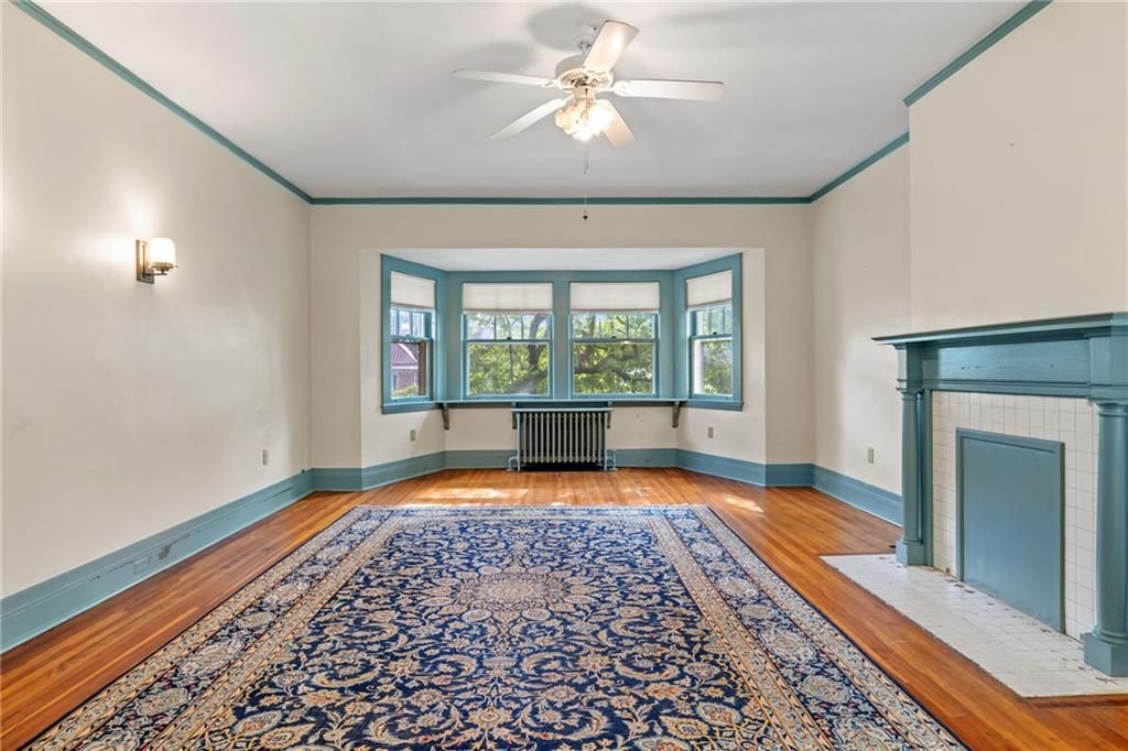 5515 Darlington Road Pittsburgh, PA 15217 - Photo 30 of 50 a view of a room with window and wooden floor