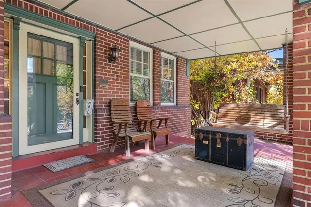 a view of a chairs and table in the patio