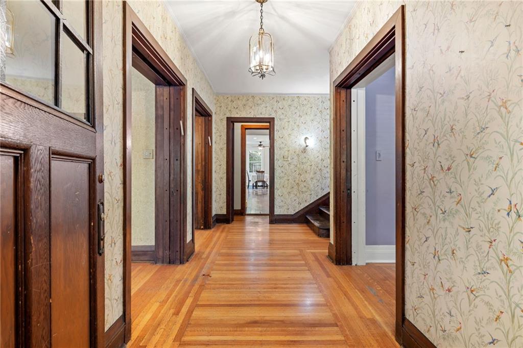 5515 Darlington Road Pittsburgh, PA 15217 - Photo 5 of 50 a view of a hallway with wooden floor and staircase