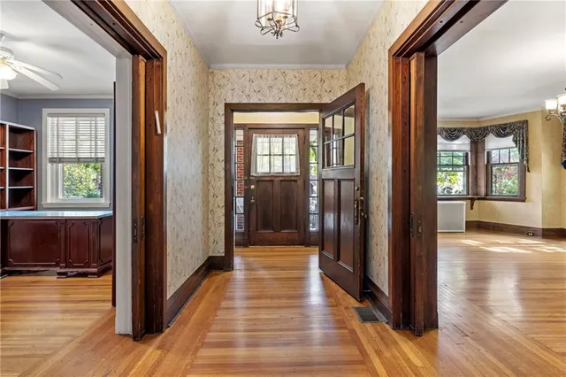 a view of livingroom with hardwood floor and hallway