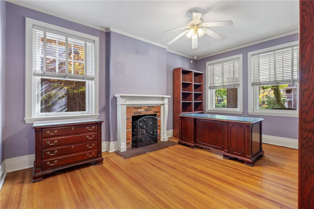 5515 Darlington Road Pittsburgh, PA 15217 - Photo 10 of 50 a room with furniture and a fireplace