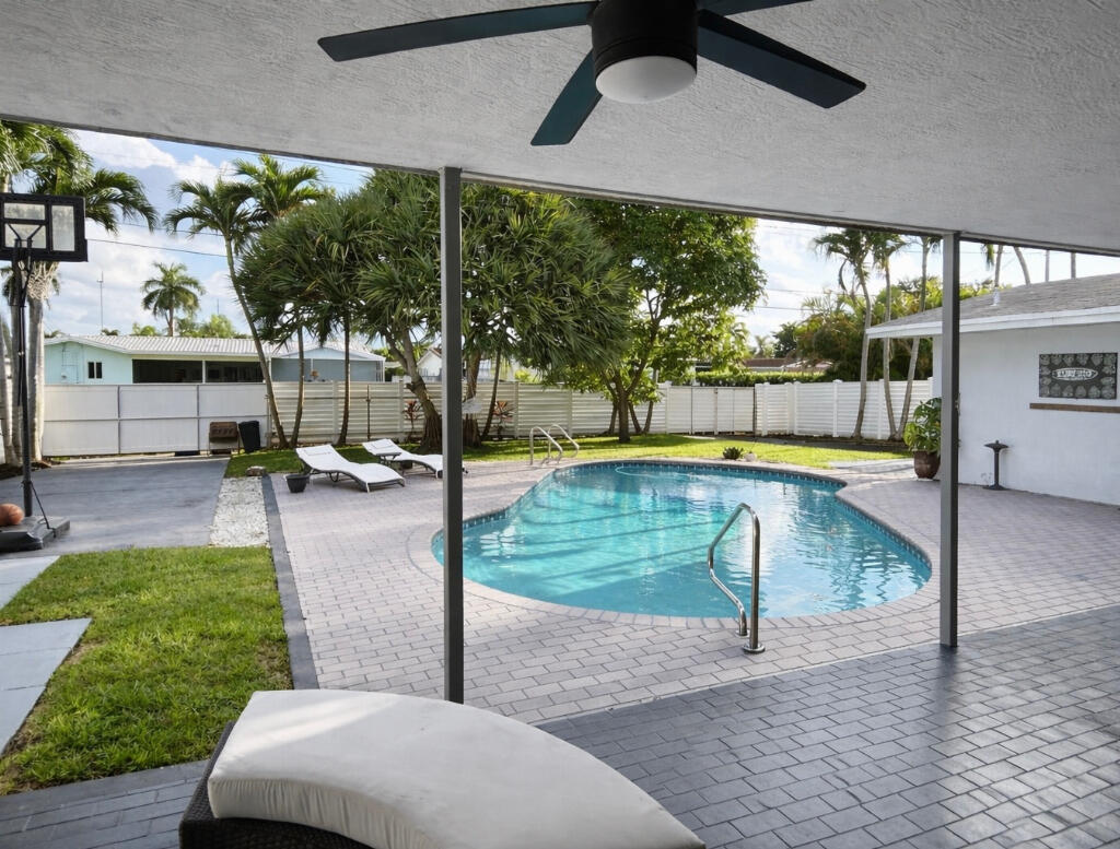 5408 Jackson Street Hollywood, FL 33021 - Photo 36 of 42 a view of a swimming pool with a patio