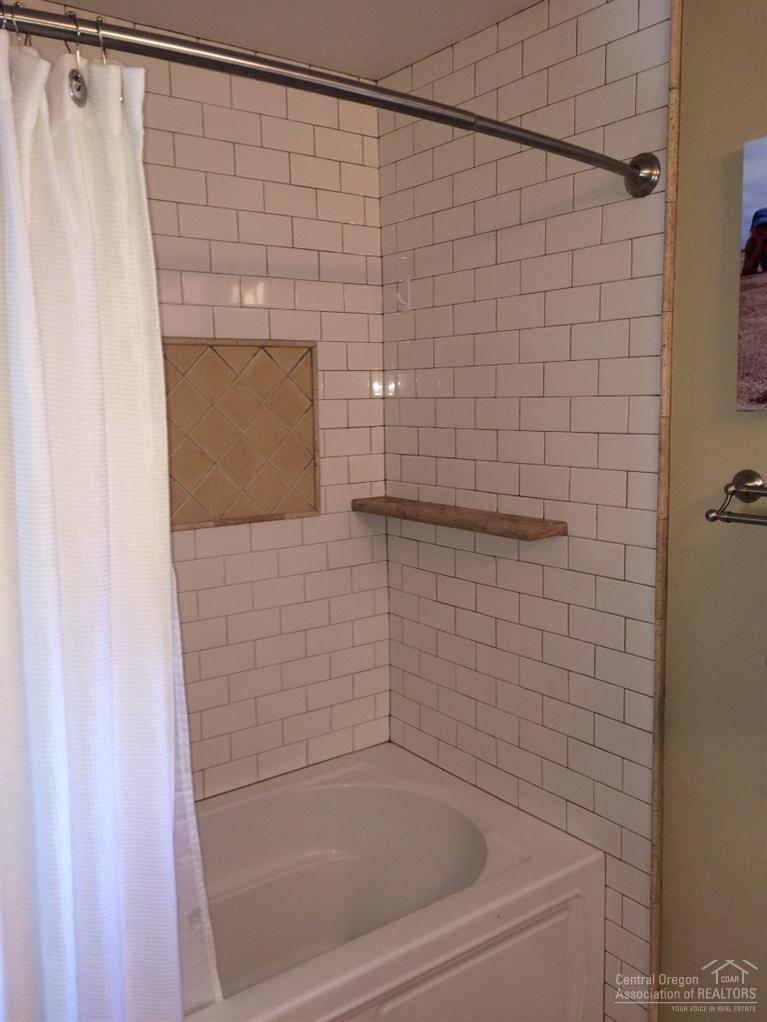 65520 Kentucky Road Bend, OR 97703 - Photo 21 of 25 a bathroom with a shower