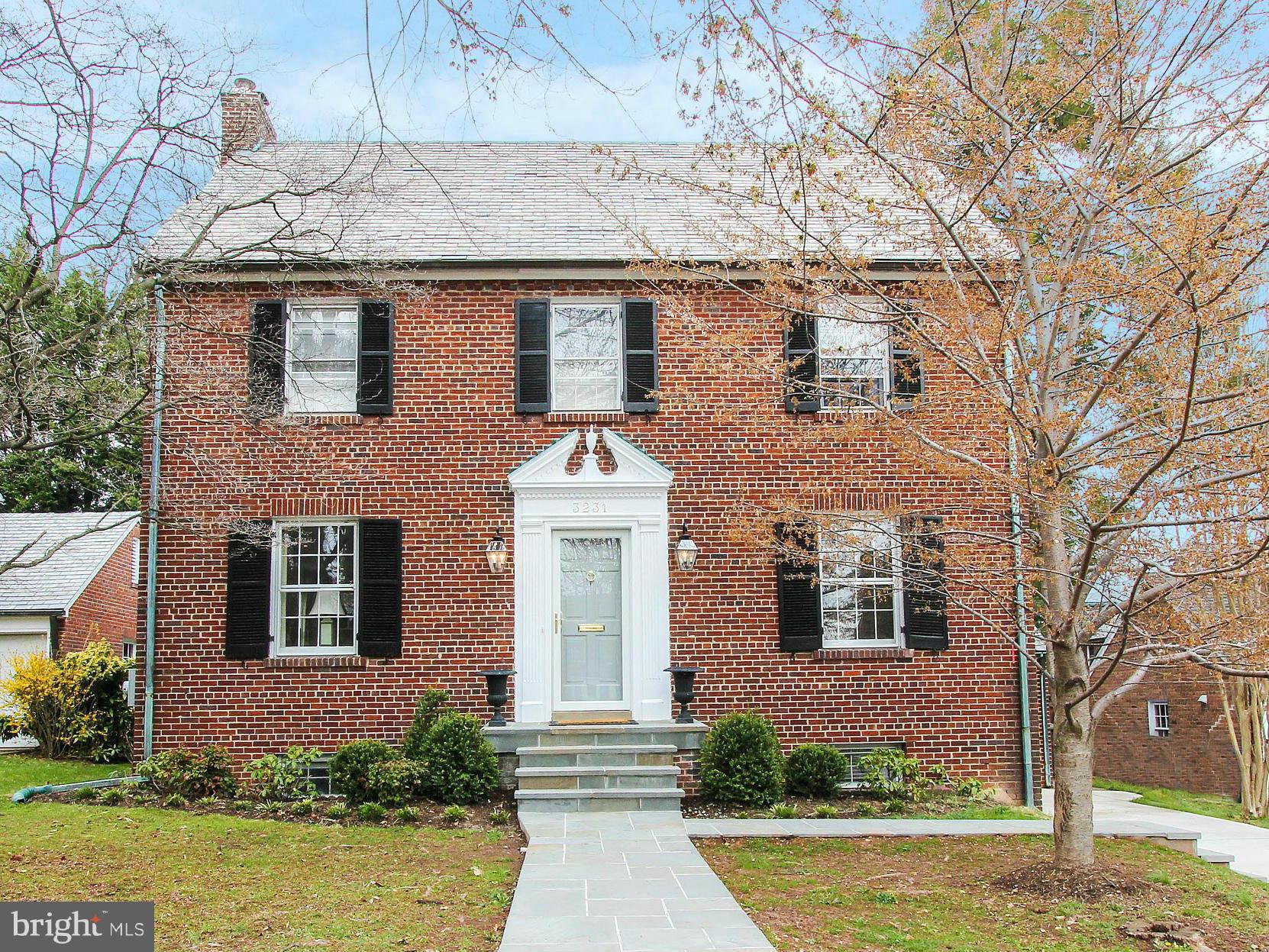front view of house with a yard
