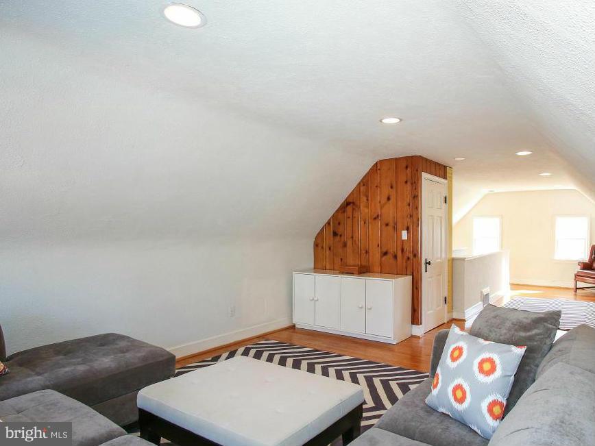 3231 Rittenhouse Street Northwest Washington, DC 20015 - Photo 21 of 27 a bedroom with a bed and a dresser