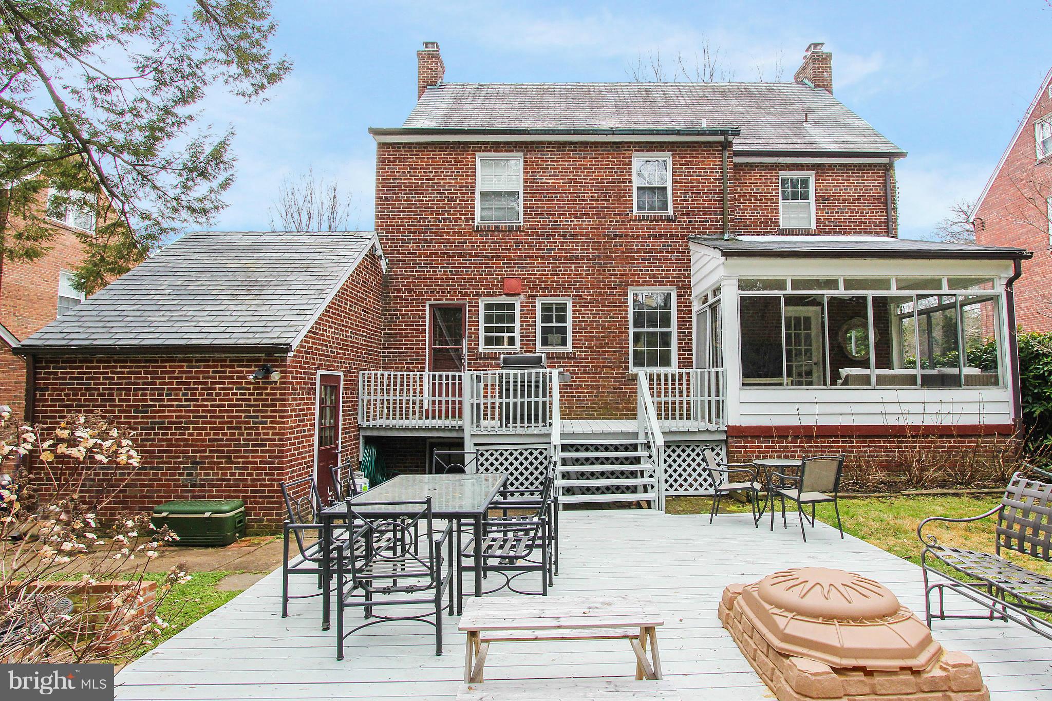 3231 Rittenhouse Street Northwest Washington, DC 20015 - Photo 22 of 27 front view of a house with a patio