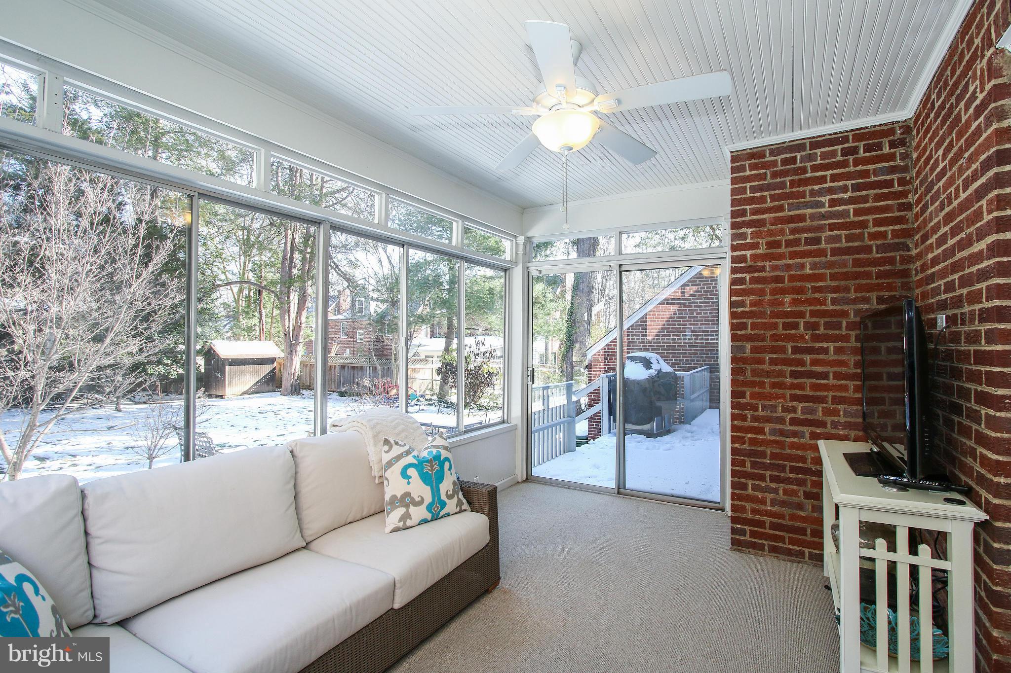 3231 Rittenhouse Street Northwest Washington, DC 20015 - Photo 5 of 27 a living room with furniture and a flat screen tv