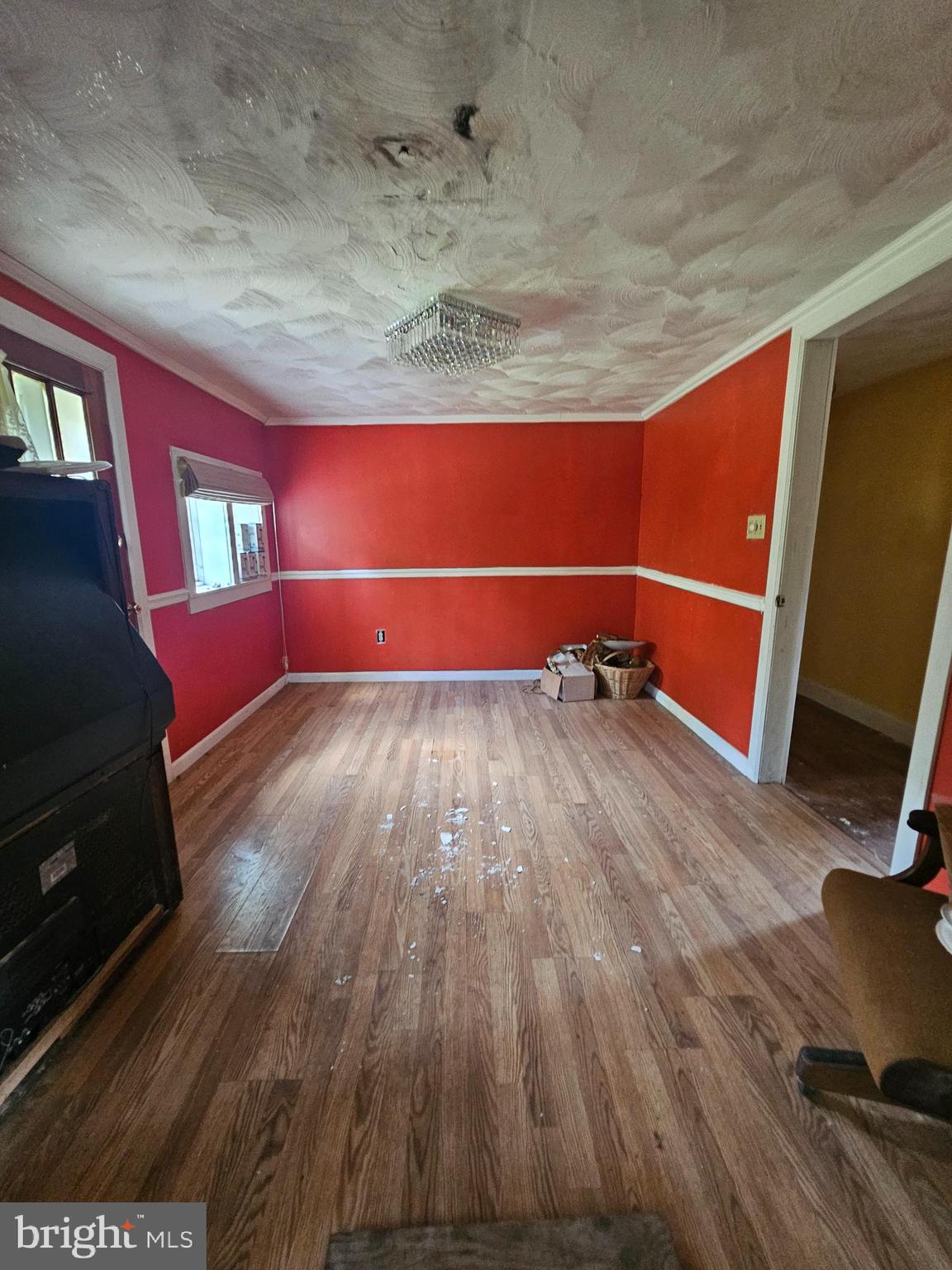 2695 Elsey Road Nanticoke, MD 21840 - Photo 16 of 46 a room with wooden floor and a window