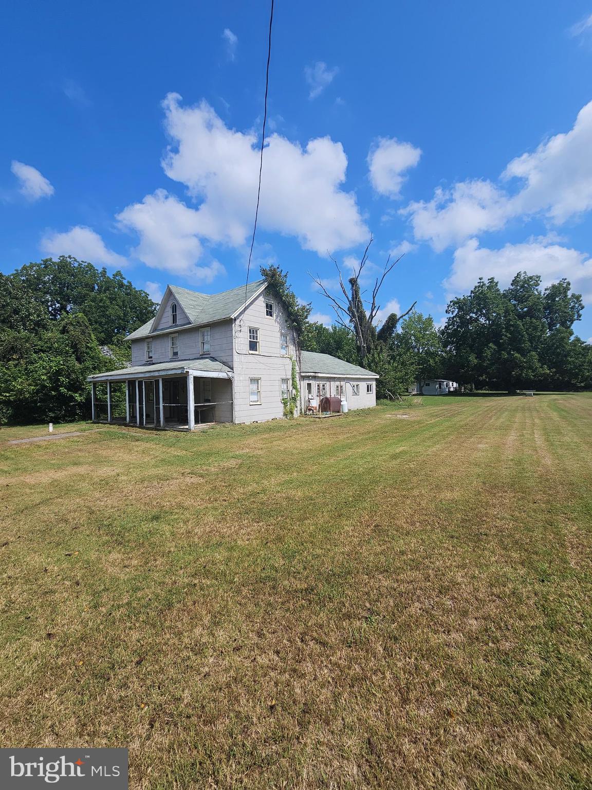 2695 Elsey Road Nanticoke, MD 21840 - Photo 2 of 46 a view of a house with a yard