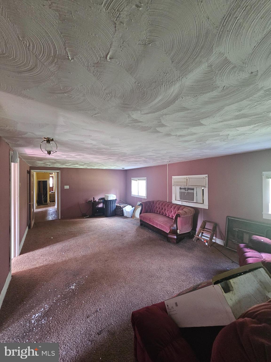 2695 Elsey Road Nanticoke, MD 21840 - Photo 24 of 46 a bed room with a bed and a couch