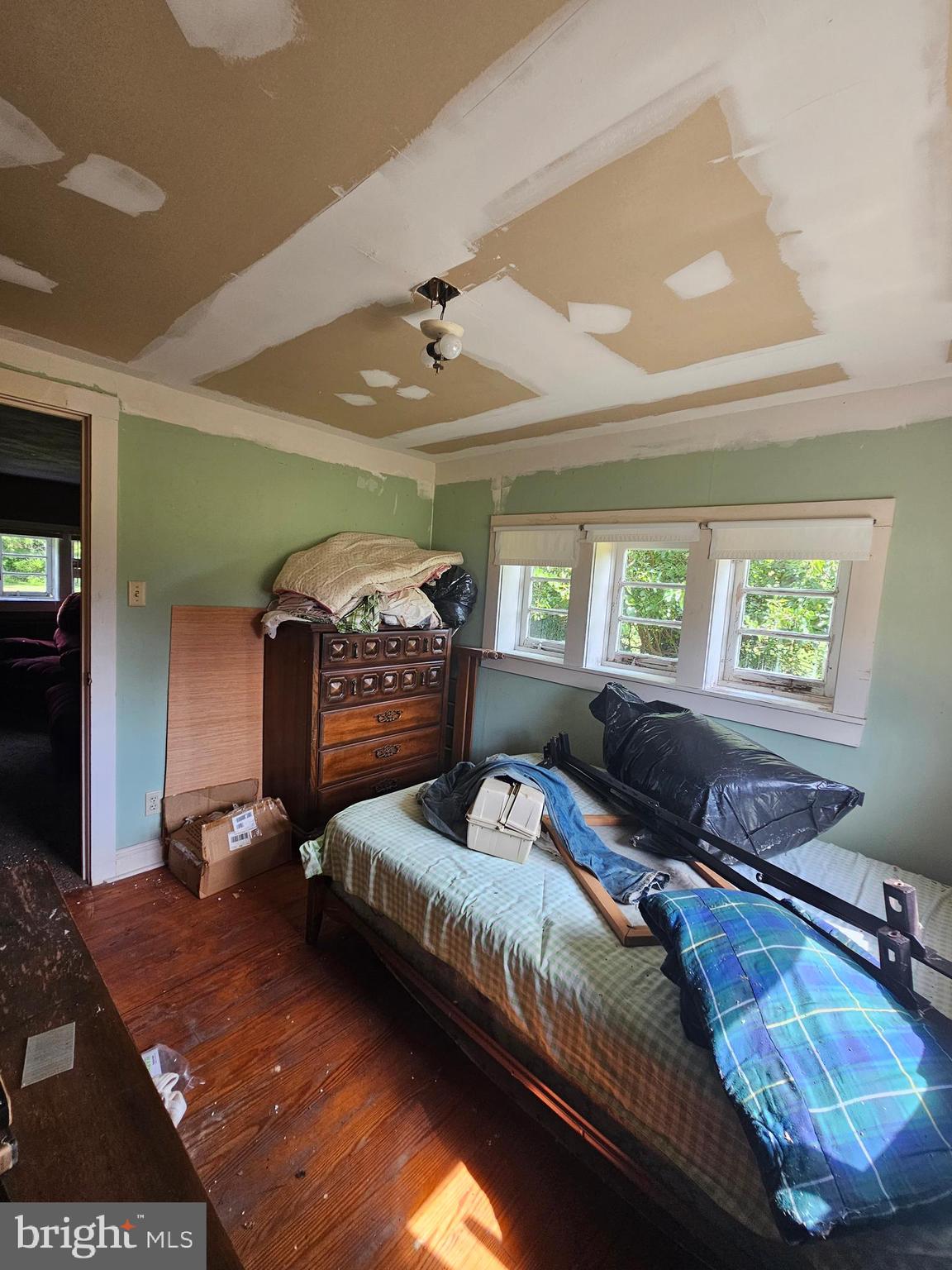 2695 Elsey Road Nanticoke, MD 21840 - Photo 26 of 46 a living room with furniture and a wooden floor