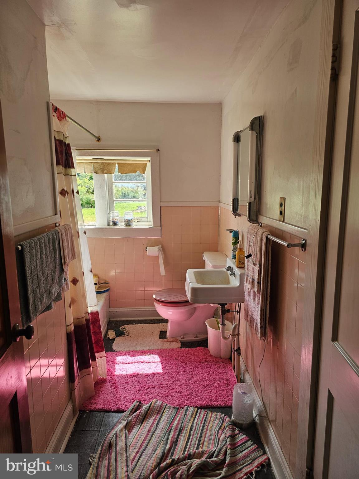 2695 Elsey Road Nanticoke, MD 21840 - Photo 28 of 46 a living room with furniture and a flat screen tv