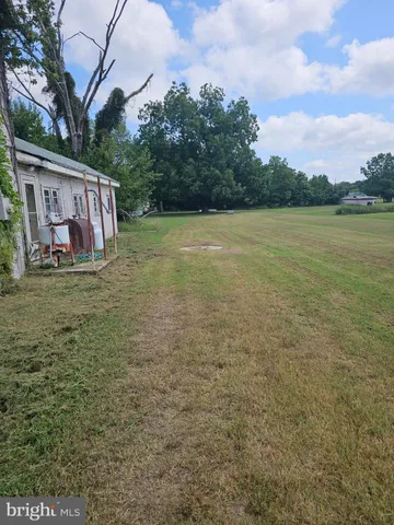 a view of a terrace with a yard