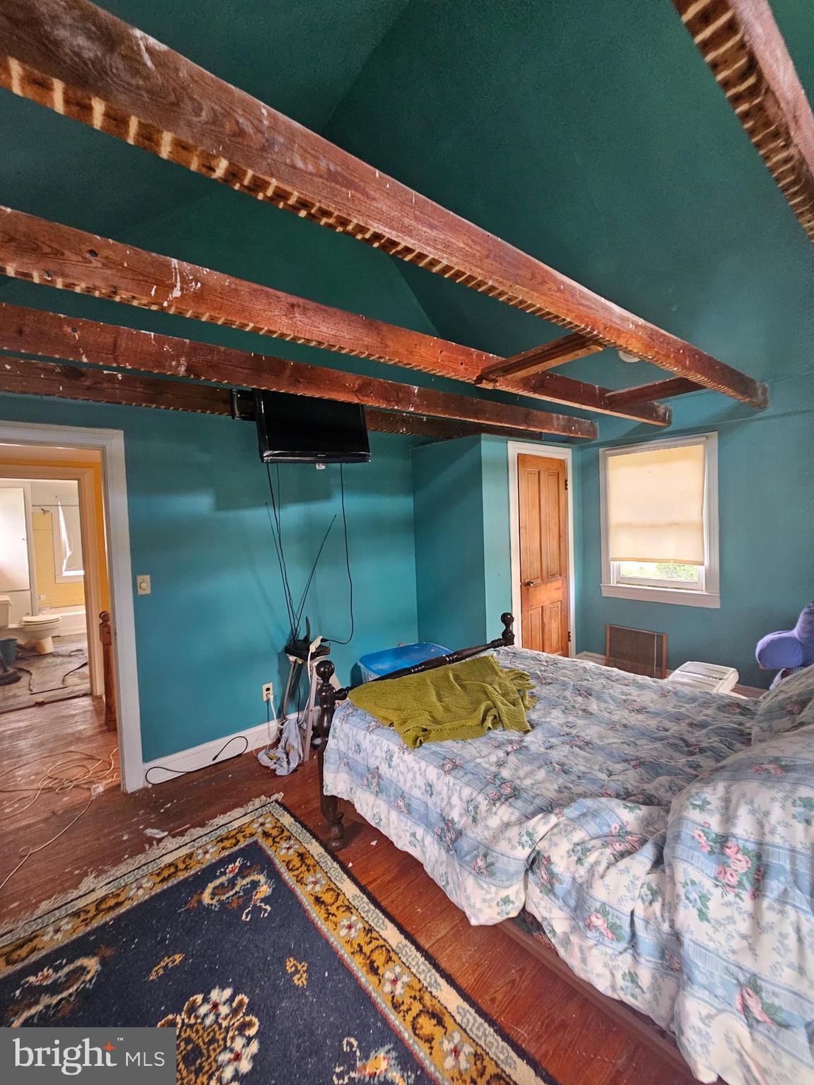 2695 Elsey Road Nanticoke, MD 21840 - Photo 31 of 46 a bedroom with a bed and a window