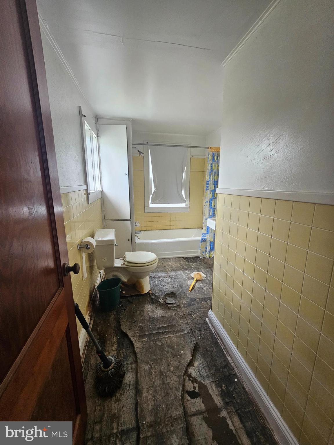 2695 Elsey Road Nanticoke, MD 21840 - Photo 35 of 46 a bathroom with a sink and mirror with toilet