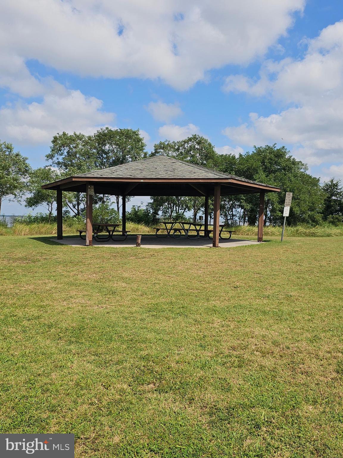 2695 Elsey Road Nanticoke, MD 21840 - Photo 43 of 46 a view of swimming pool with outdoor seating and lake