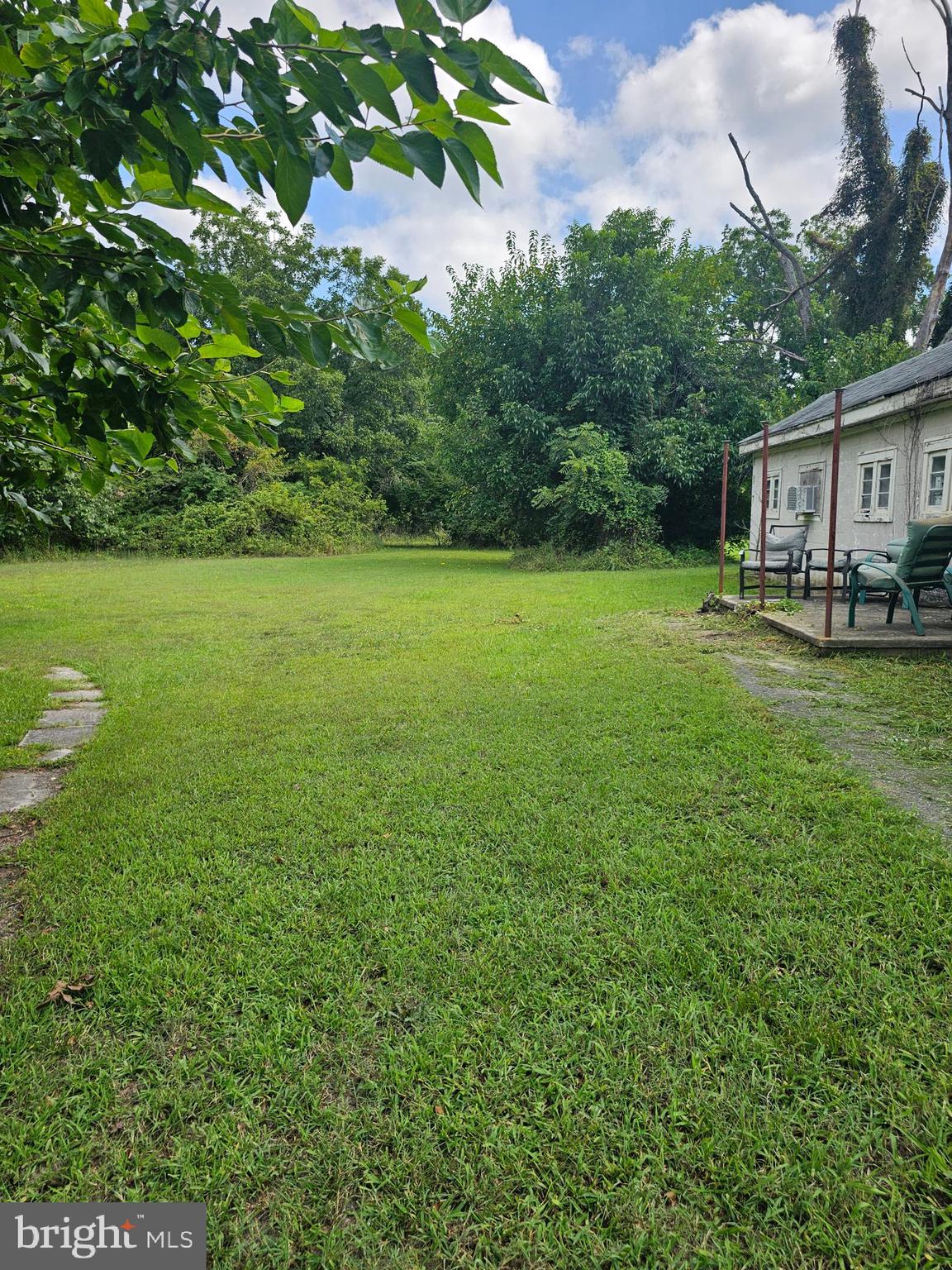 2695 Elsey Road Nanticoke, MD 21840 - Photo 9 of 46 a view of a house with a yard