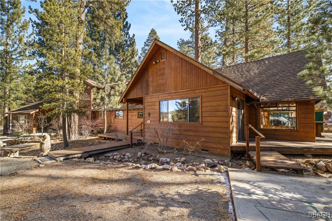 39585 Lakeview Pines Road Big Bear Lake, CA 92315 - Photo 10 of 49 a view of a house with a yard