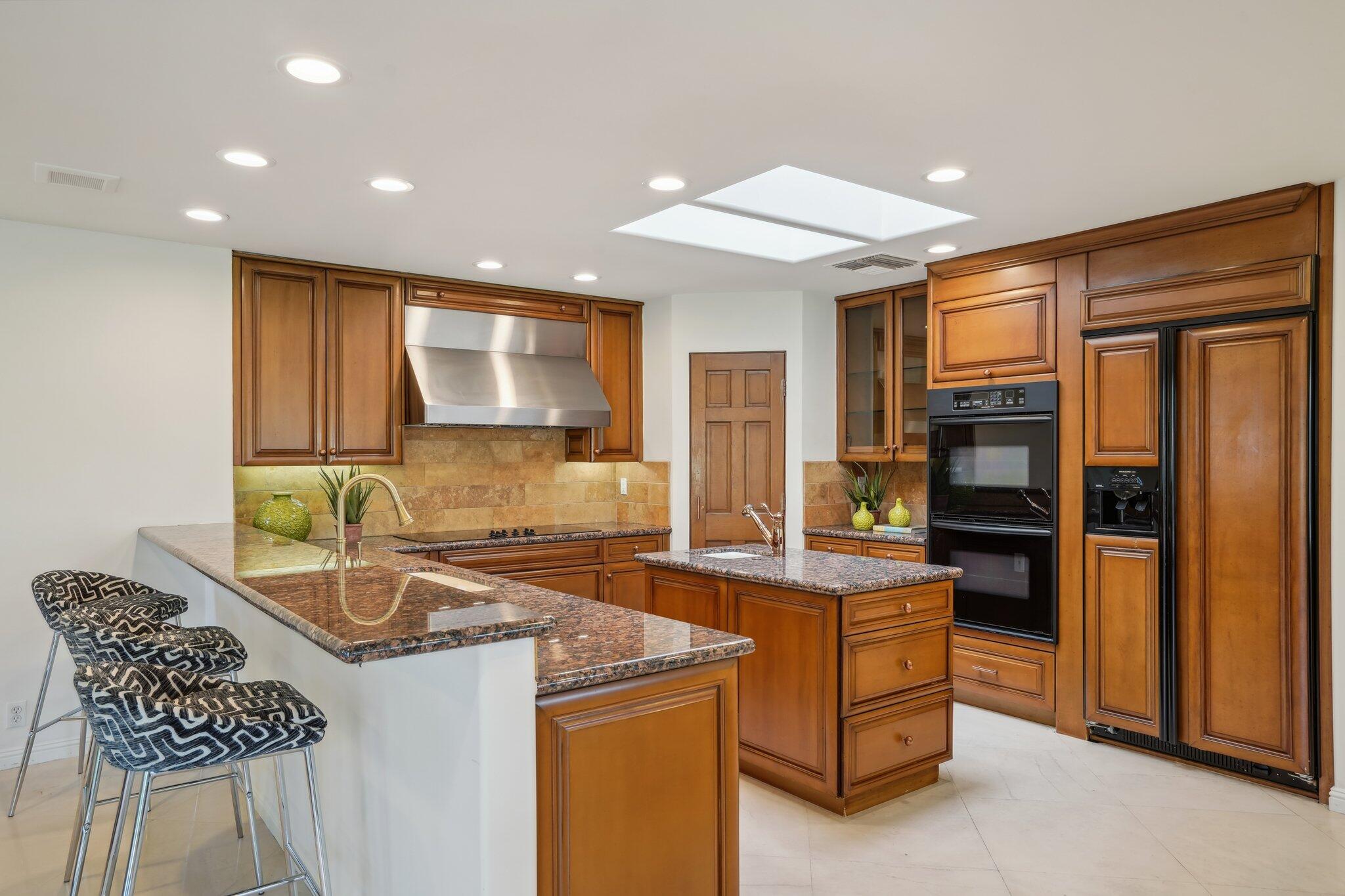 1 Exeter Court Rancho Mirage, CA 92270 - Photo 13 of 41 Kitchen with walk-in pantry