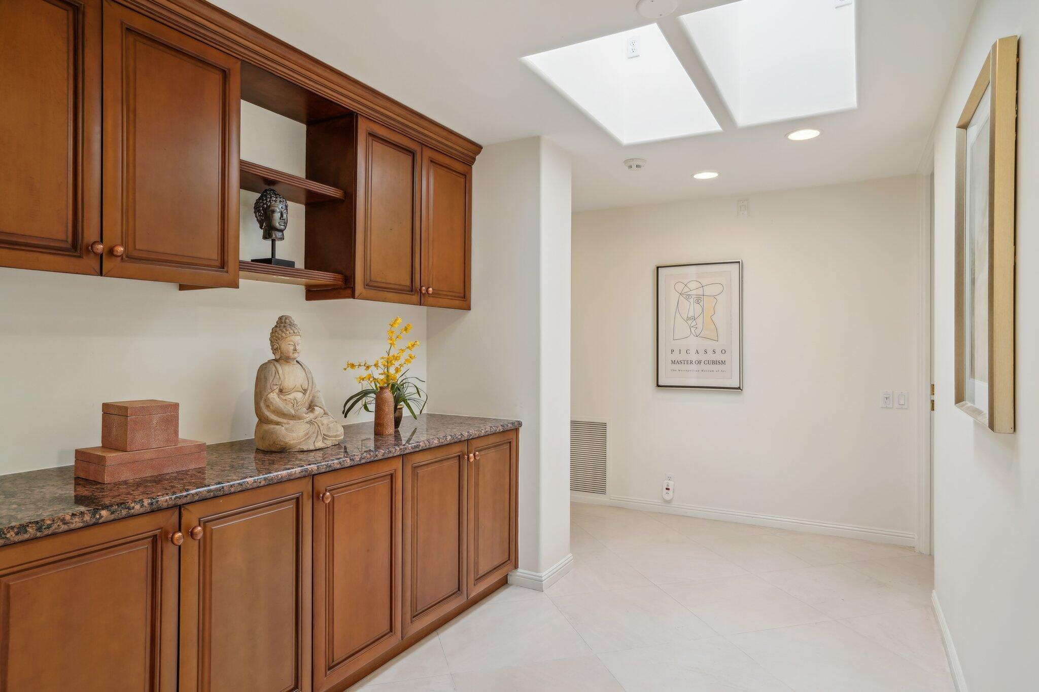 1 Exeter Court Rancho Mirage, CA 92270 - Photo 18 of 41 Hallway with storage
