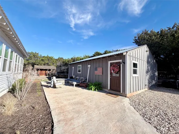 a view of a house with a patio