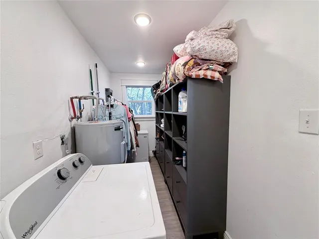 a bed room with a bed and a book shelf