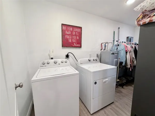 a utility room with dryer and washer