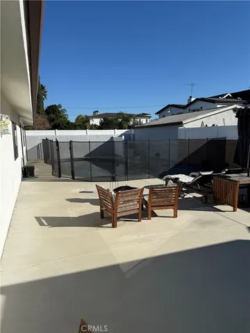 a view of a backyard with a tub