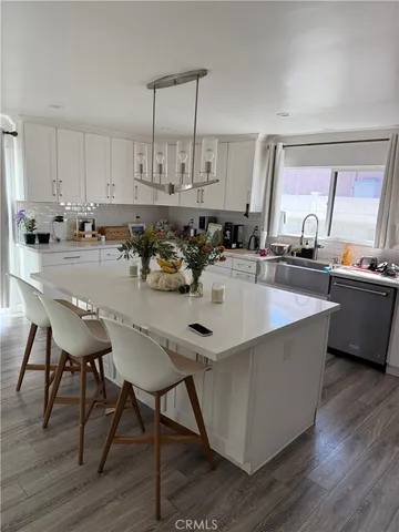 a view of dining room with cabinet