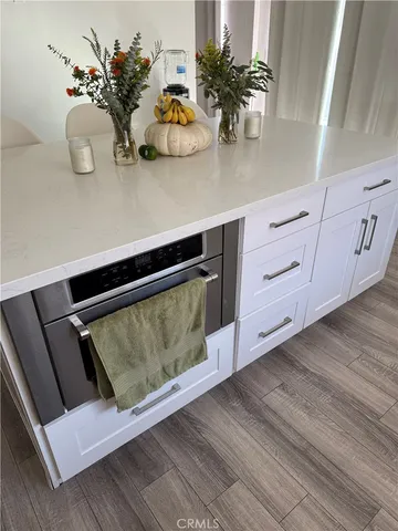 a room with furniture pool table and couch