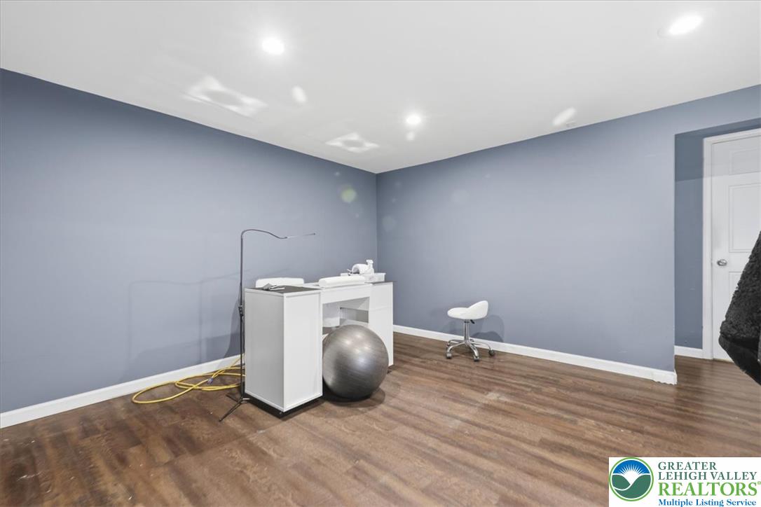 520 Highland Hill Road Jim Thorpe, PA 18235 - Photo 44 of 83 Recessed lighting illuminates the durable wood flooring in this versatile room.