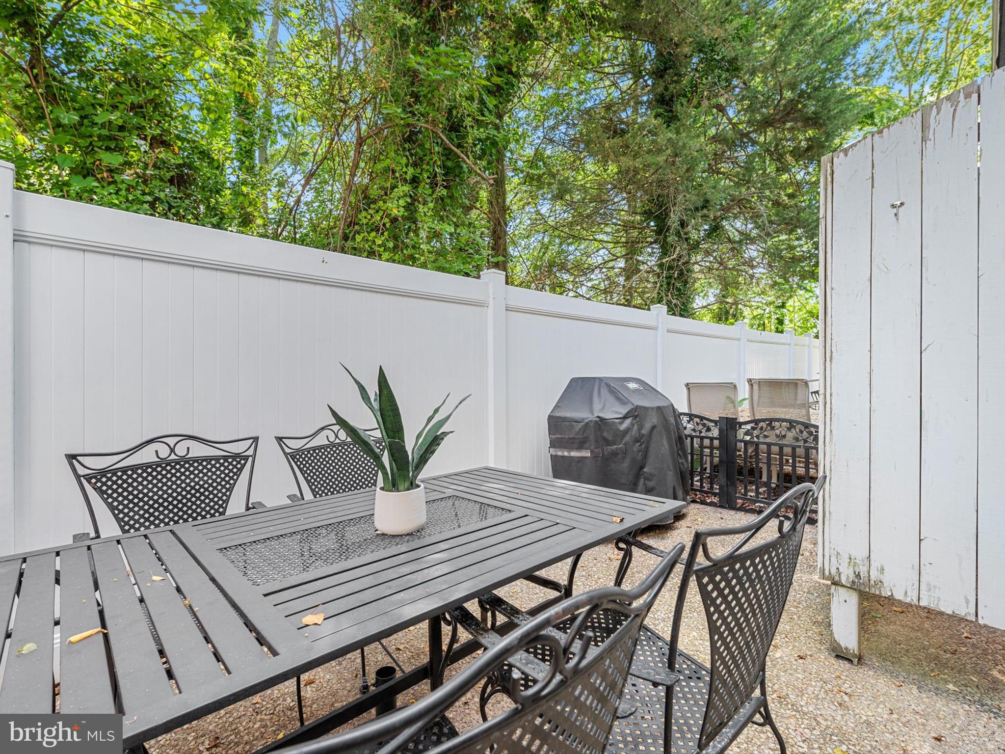 20294 State Road, Unit 8 Rehoboth Beach, DE 19971 - Photo 2 of 57 Rear Patio, Privacy Fencd