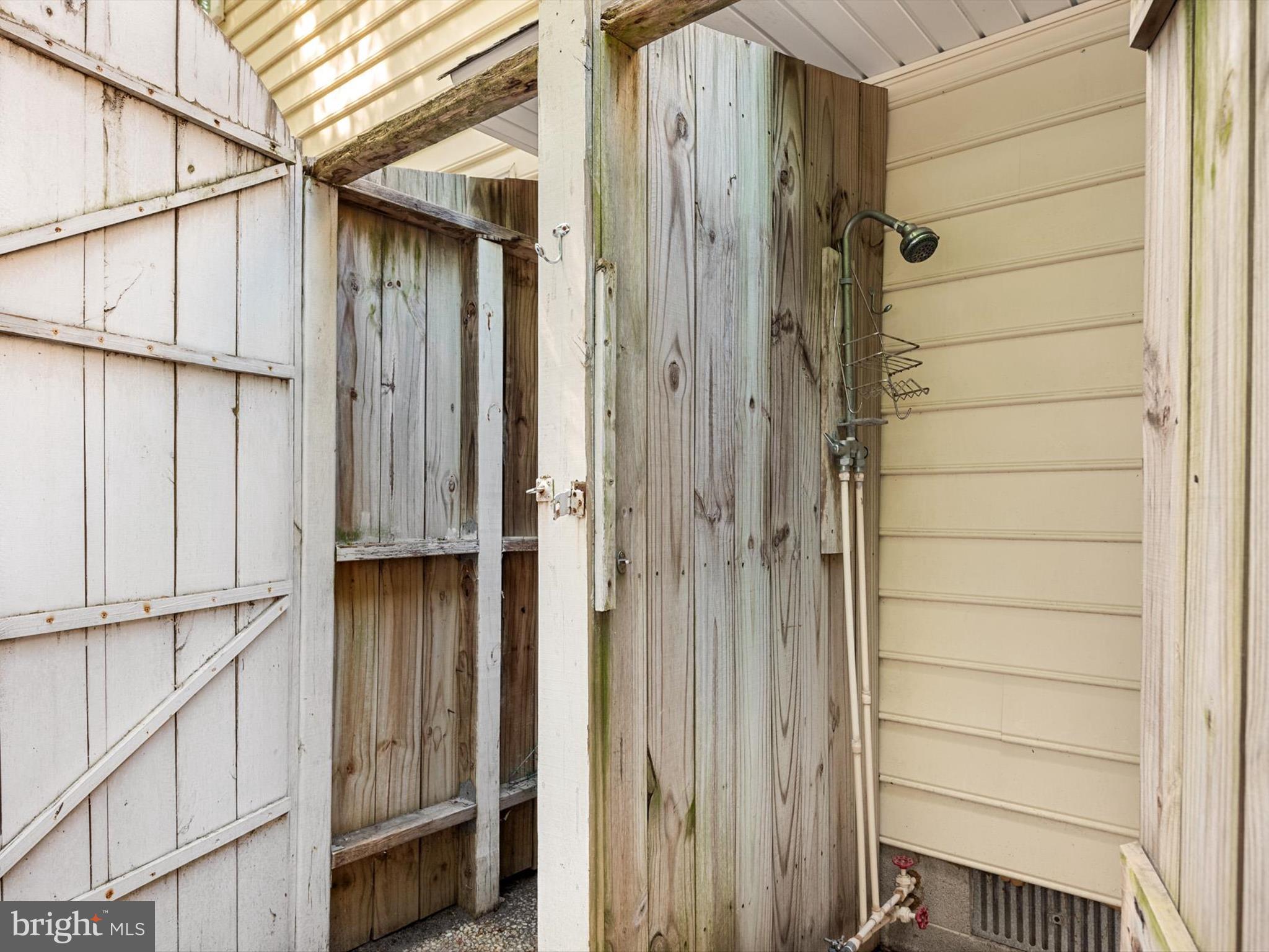 20294 State Road, Unit 8 Rehoboth Beach, DE 19971 - Photo 42 of 57 Outdoor Shower