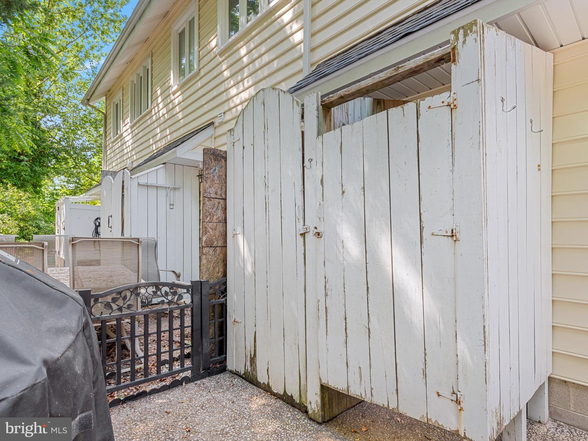 20294 State Road, Unit 8 Rehoboth Beach, DE 19971 - Photo 43 of 57 Outdoor Shower/Storage