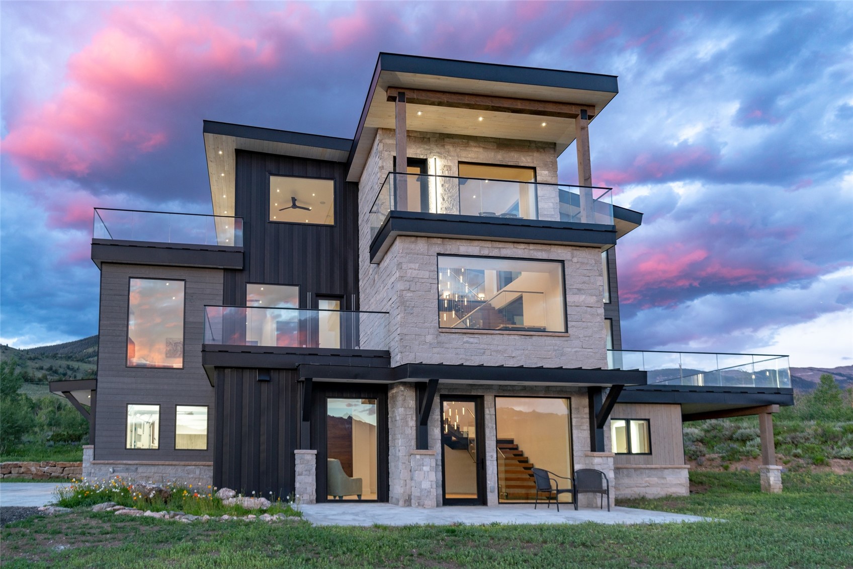 2150 Elk Run Road Silverthorne, CO 80498 - Photo 2 of 29 Front of house at dusk.