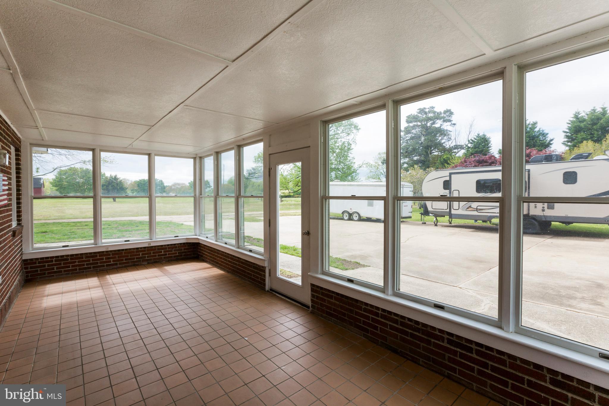 37700 Waterloo Road Coltons Point, MD 20626 - Photo 16 of 27 Nice sized Sunroom with tile flooring!