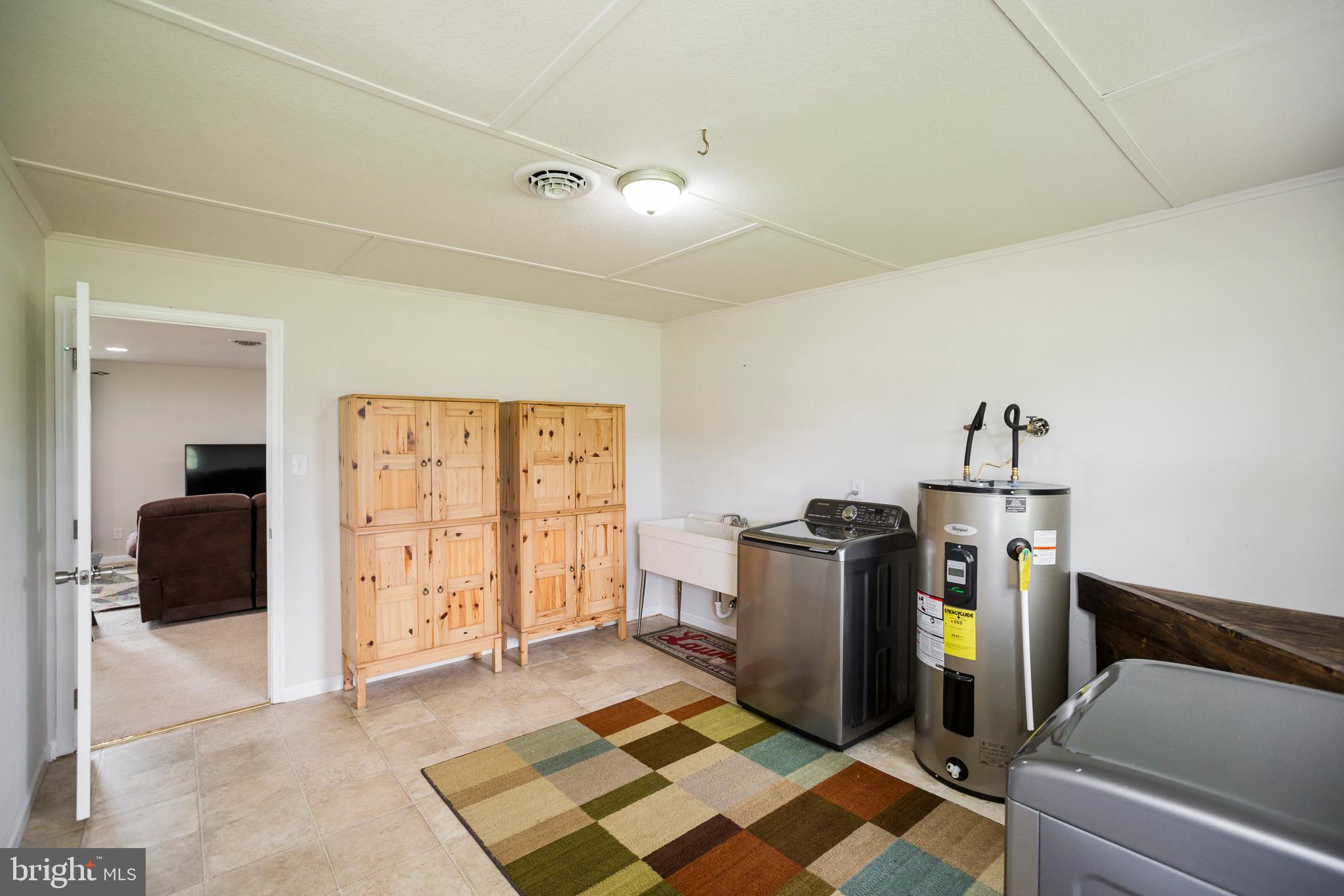 37700 Waterloo Road Coltons Point, MD 20626 - Photo 18 of 27 Very large laundry, utility, and storage area.