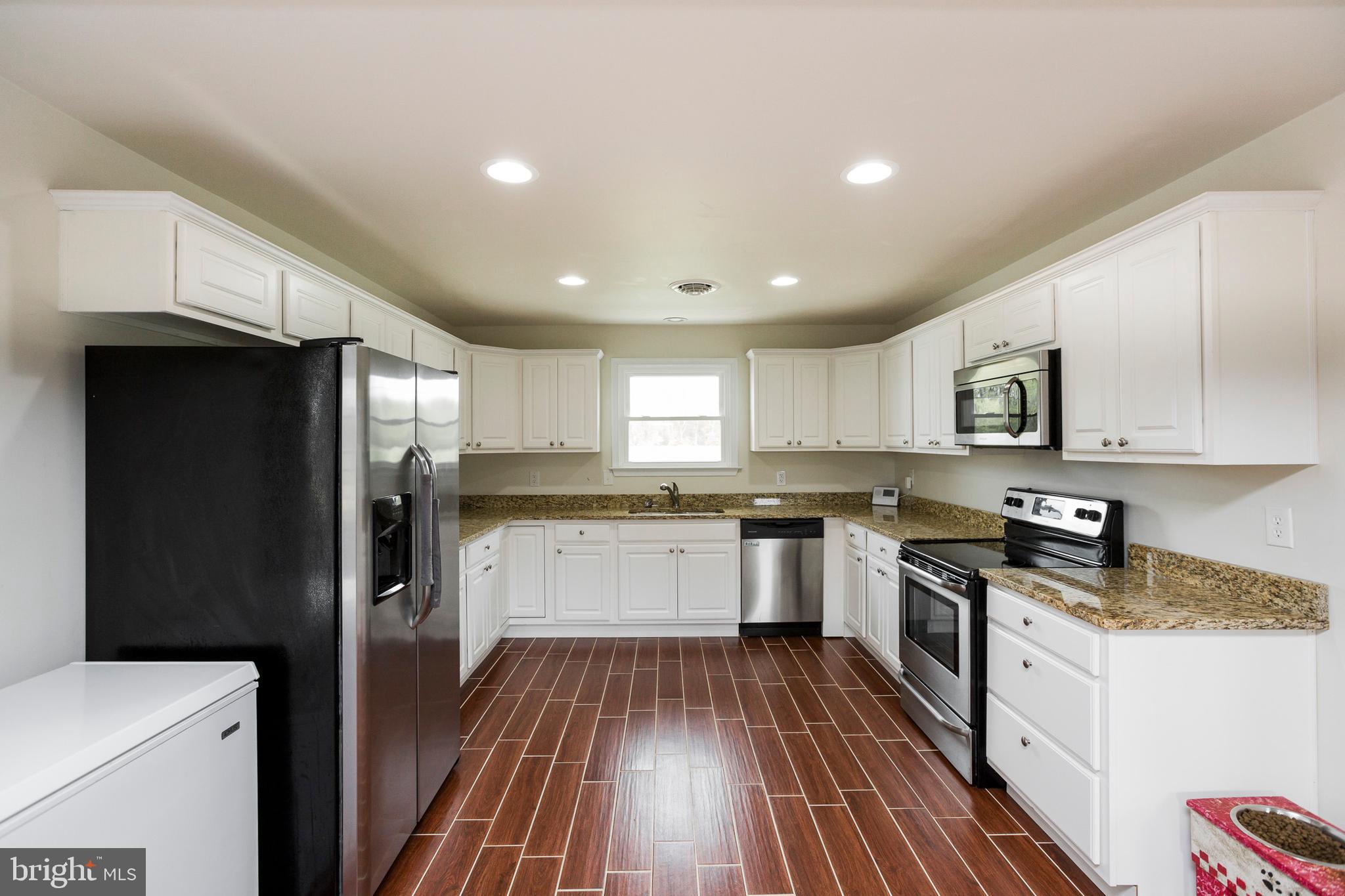 37700 Waterloo Road Coltons Point, MD 20626 - Photo 4 of 27 Granite and SS kitchen