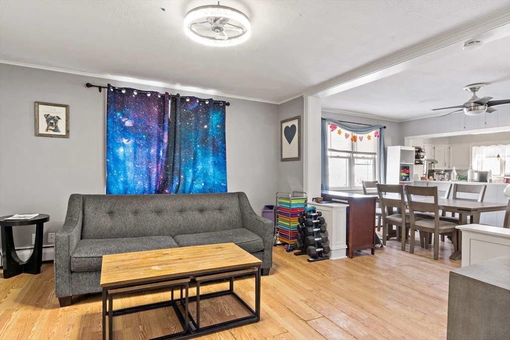 677 Oak Grove Avenue Fall River, MA 02720 - Photo 19 of 26 a living room with furniture and a window