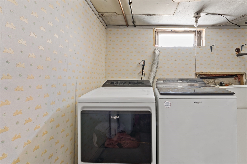 677 Oak Grove Avenue Fall River, MA 02720 - Photo 21 of 26 a utility room with dryer and washer
